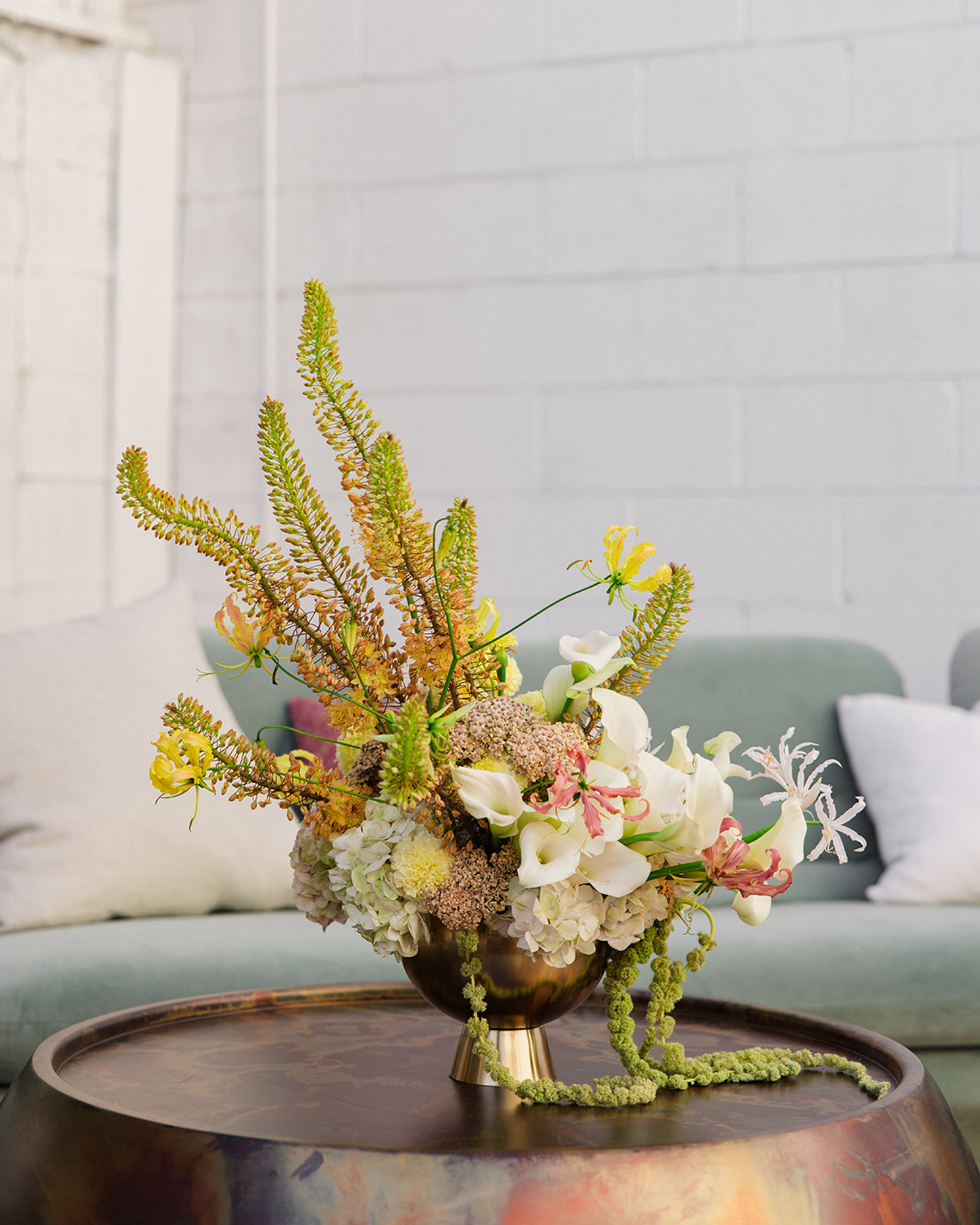 Sculptural event centerpiece in a footed vessel
